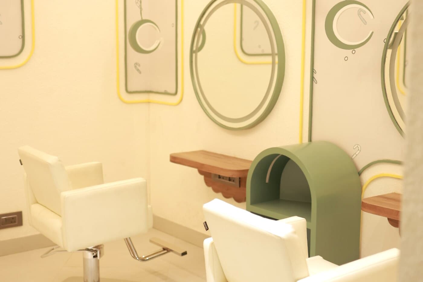 Private styling stations with arched mirrors at Page 3 Salon, KK Nagar East, Madurai