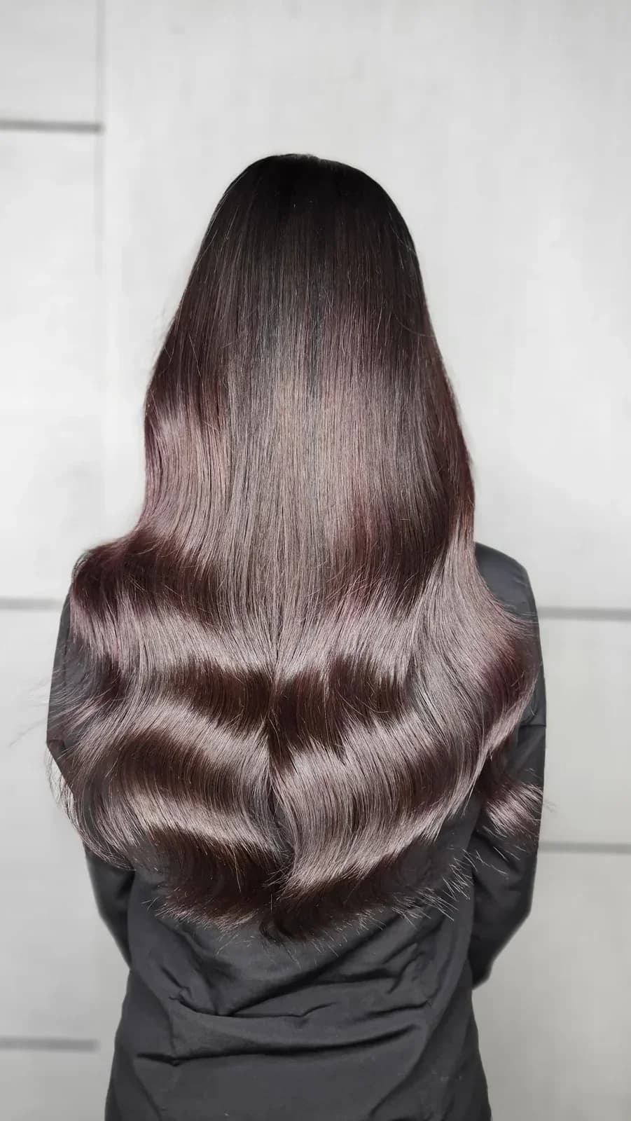 Glossy, smooth, frizz-free hair after a hair smoothening treatment at Page 3 Luxury Salon, Madurai